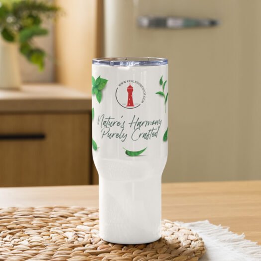 Customized white tumbler with green leaf design.